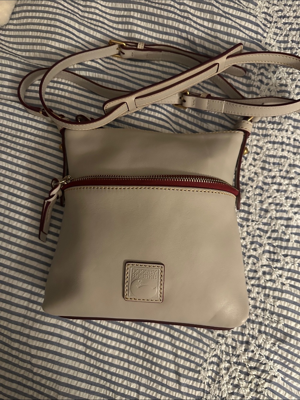 Dooney & Bourke Florentine Letter Carrier in ecru color
